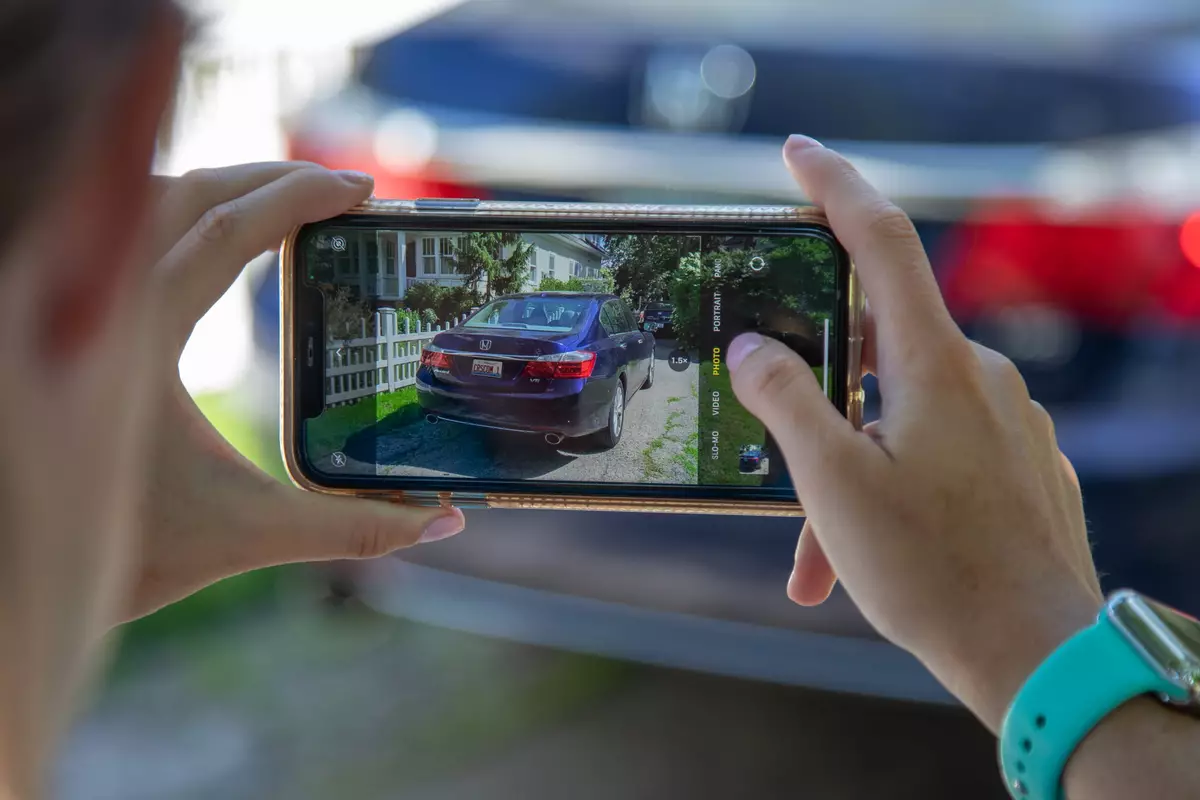Taking a picture of a car