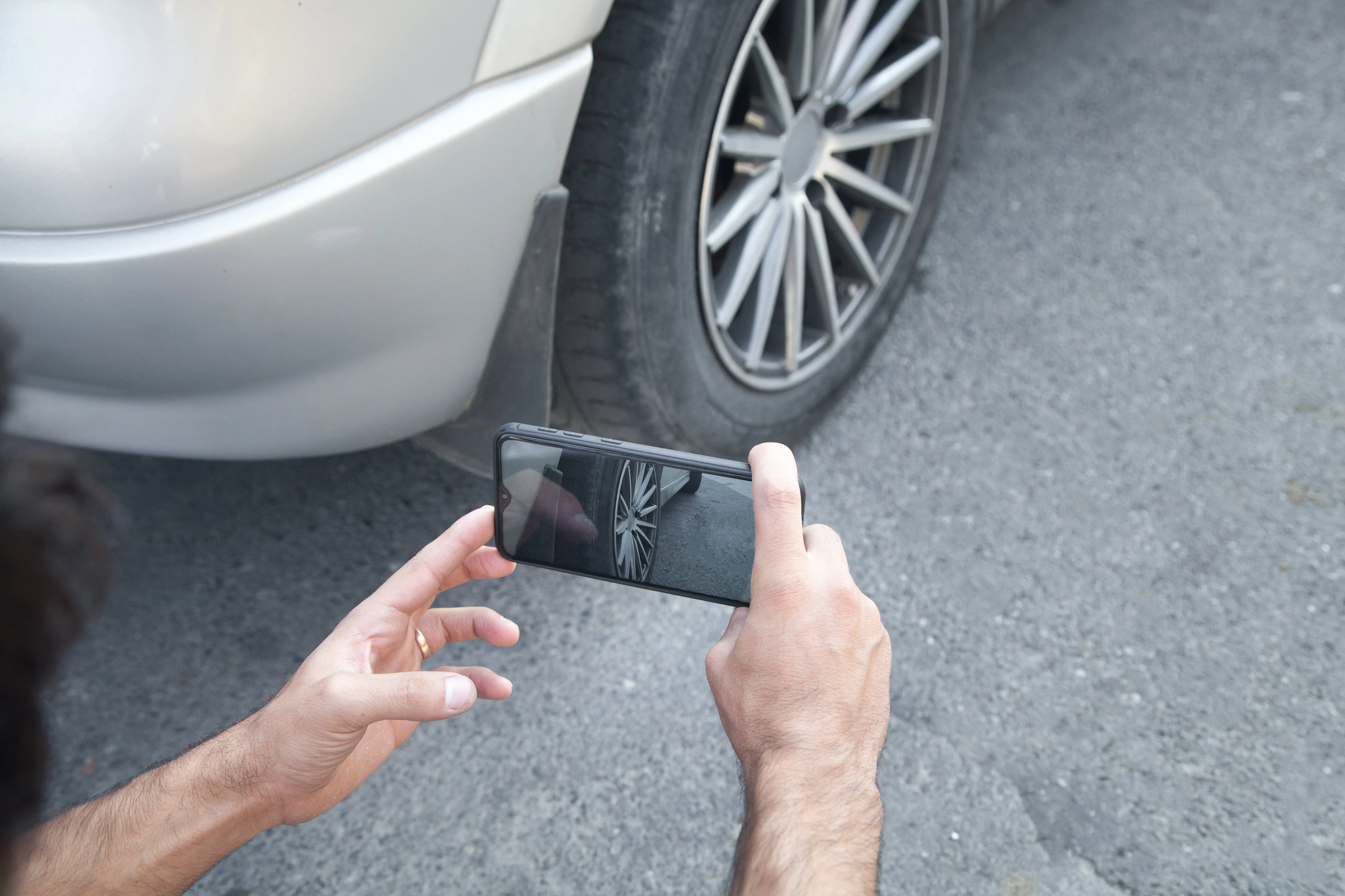 Taking a picture of a car wheel